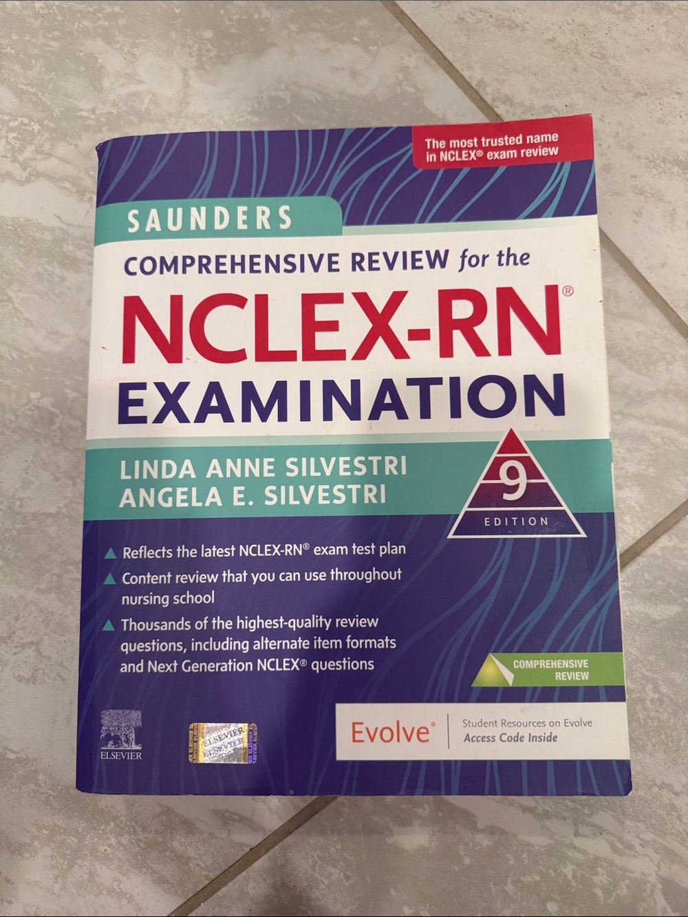 Saunders NCLEX-RN Examination Review Book - Teal, Purple, White, Red